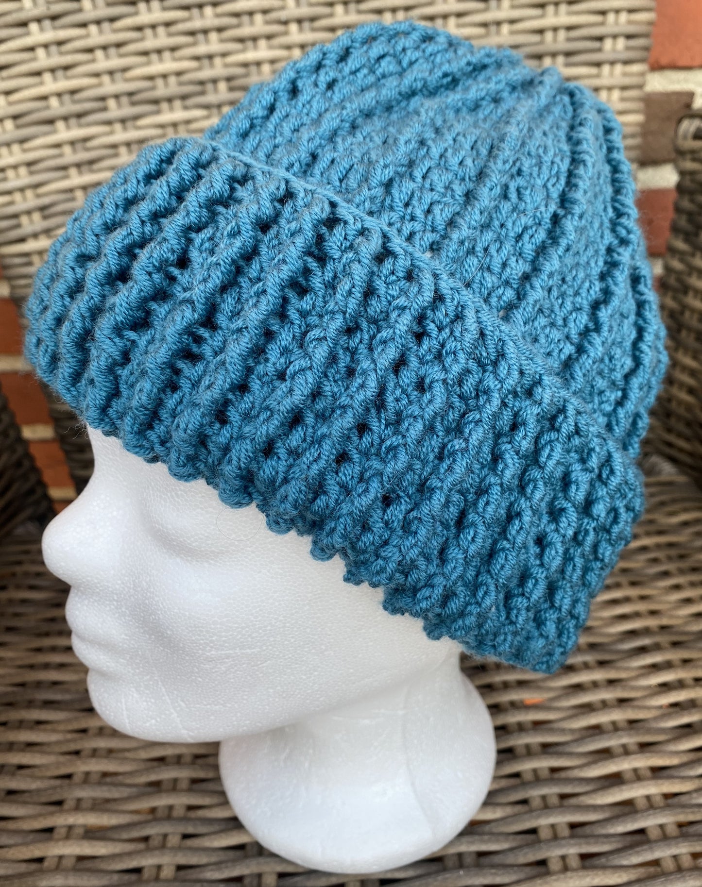 Skøn hæklet hue i blød merino uld