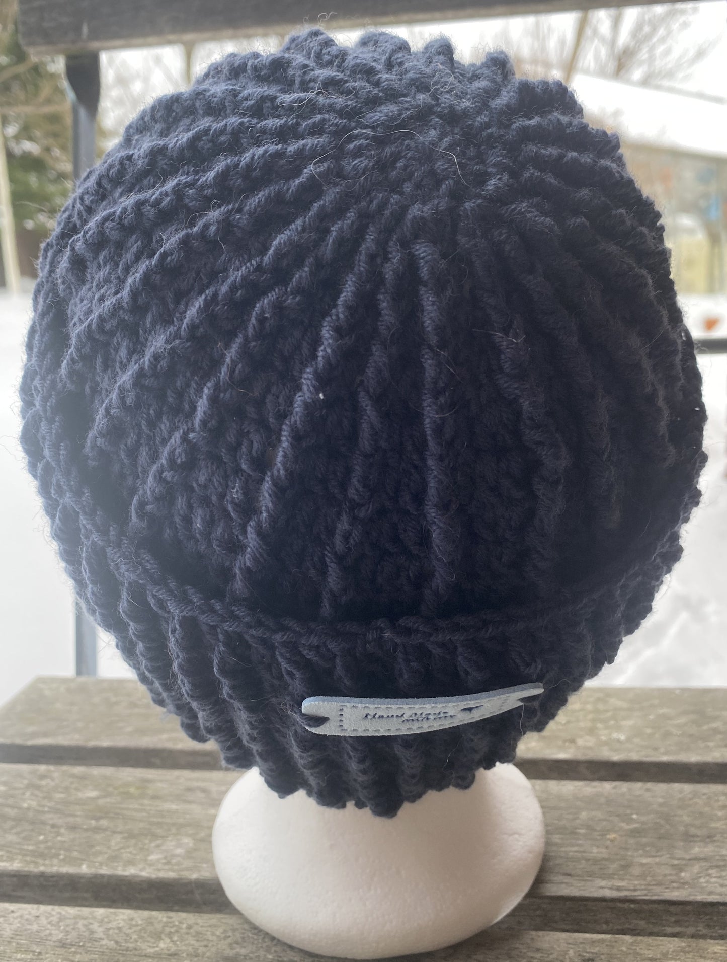 Skøn hæklet hue i blød merino uld