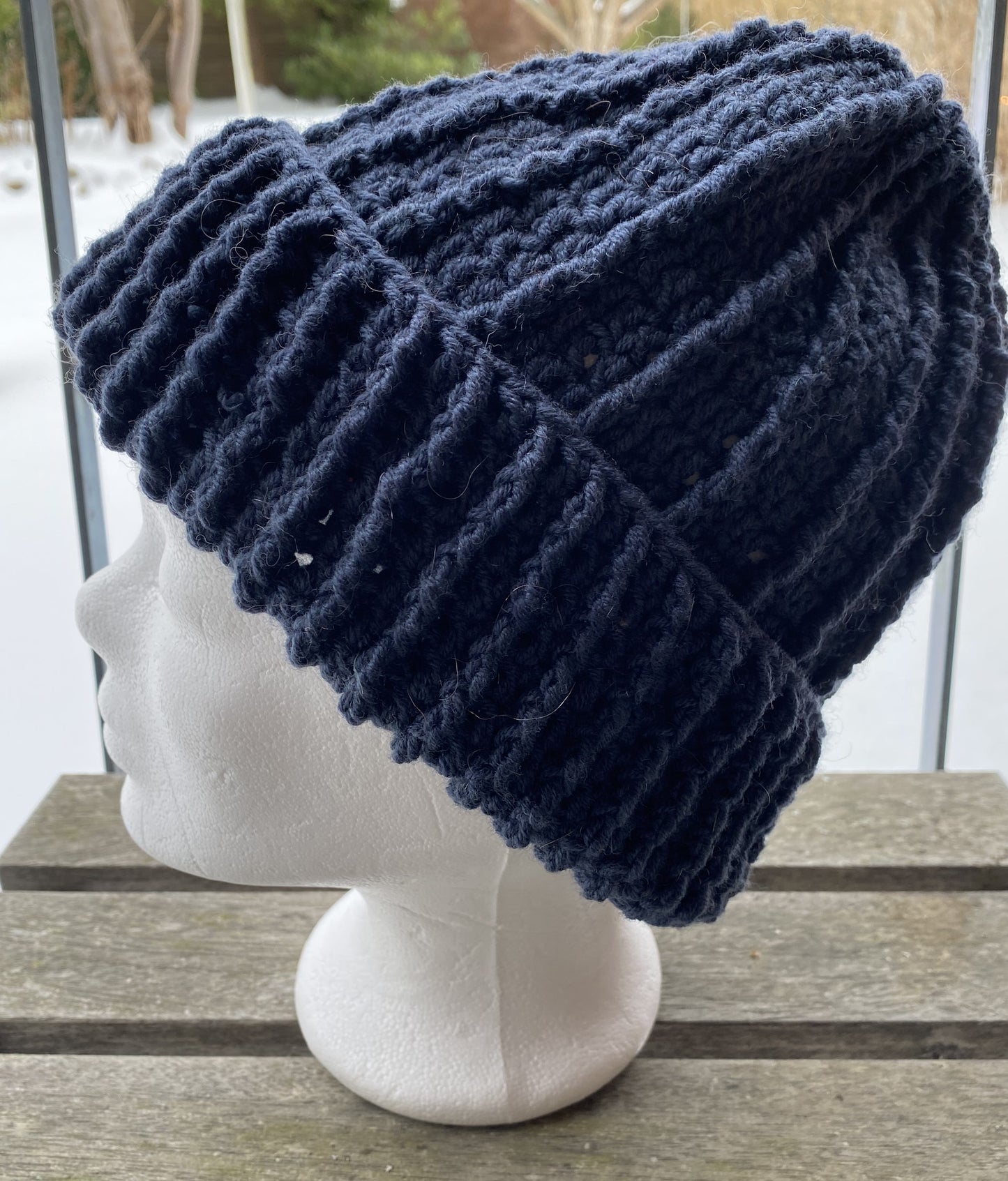 Skøn hæklet hue i blød merino uld